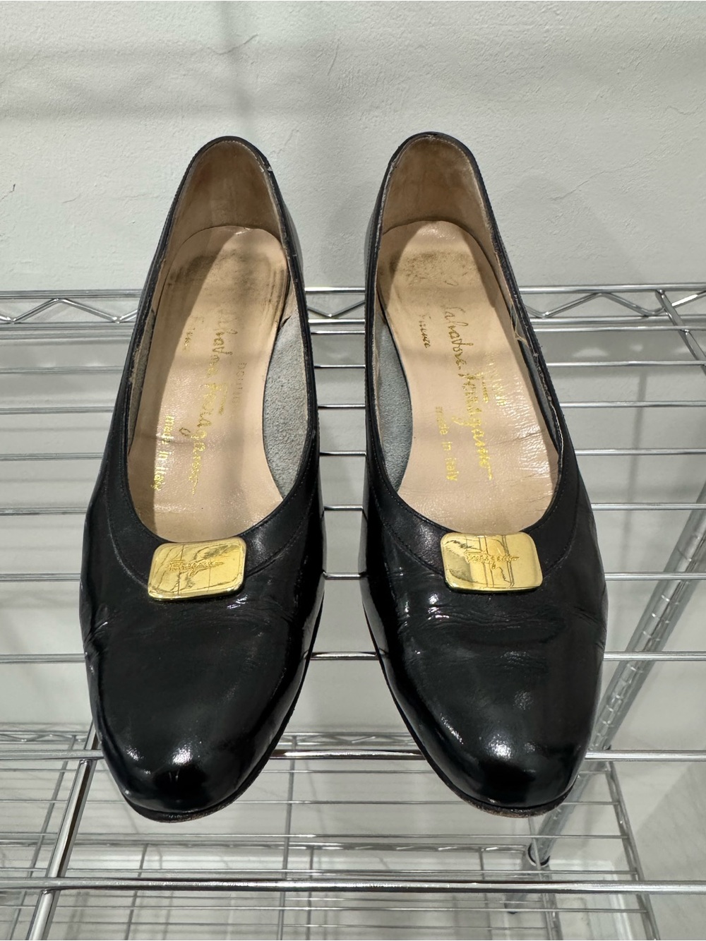 Salvatore Ferragamo Black Leather Vara Flats with Gold Plaque